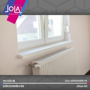 Fehér műanyag ablakpárkány és radiátor Székesfehérvár JOLA kivitelezésben