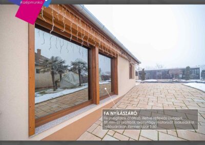 Fa nyílászáró aranytölgy színben, Sarkadon, fix üvegfallal, reflexiós üveggel